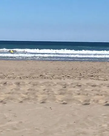 Charming Beachfront Apartment/ Encantador Apartamento Frente Al Mar Apartment